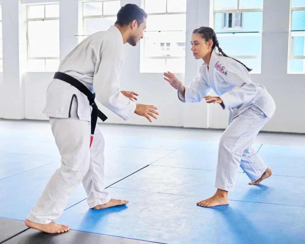 karate-martial-arts-and-man-and-woman-fight