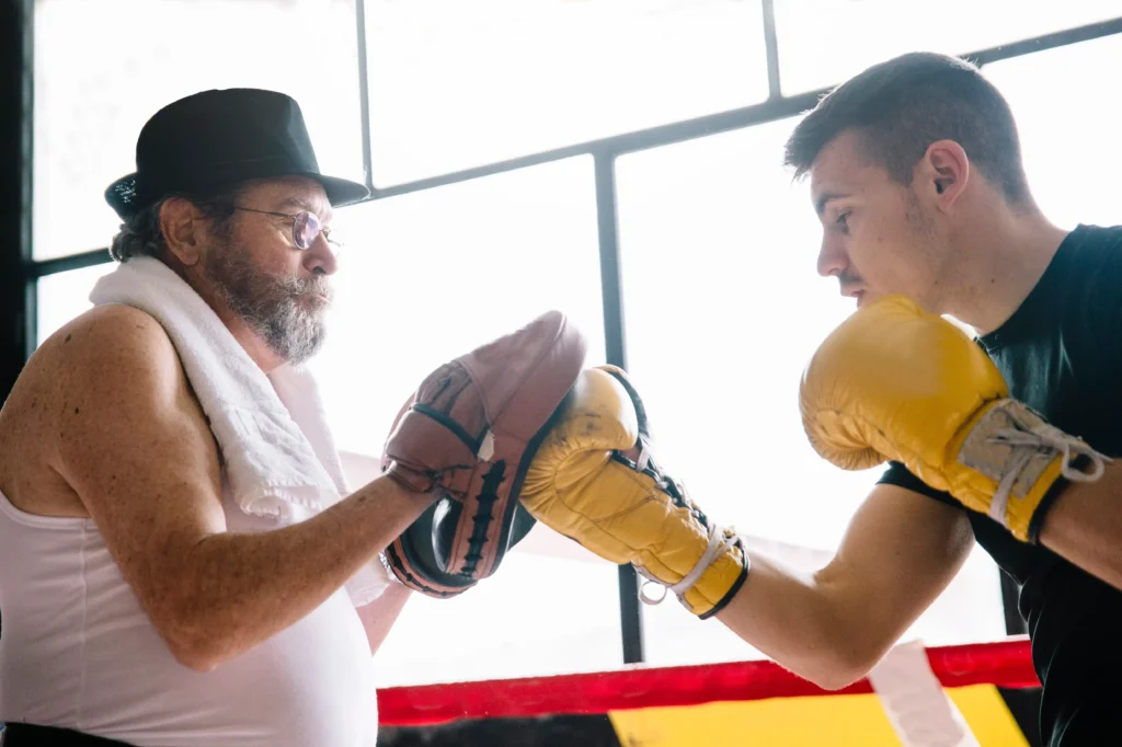 boxer-and-trainer-learning-to-punch