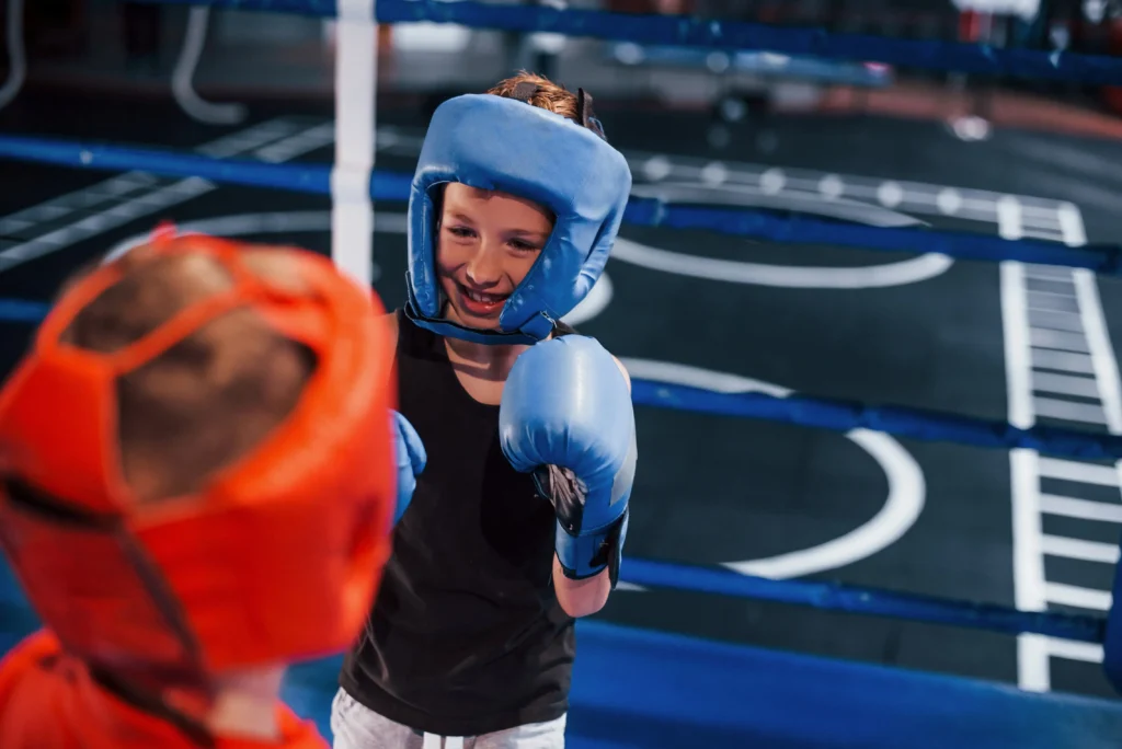 two-boys-in-protective-equipment-have-sparring