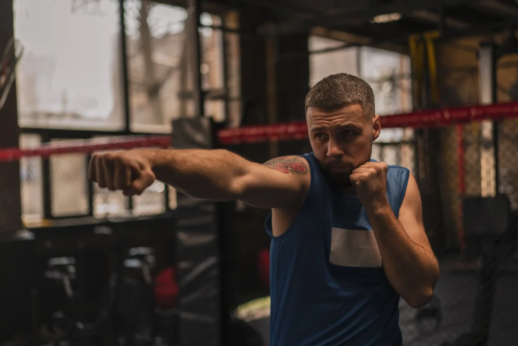 a boxer in the gym who fights with shadow