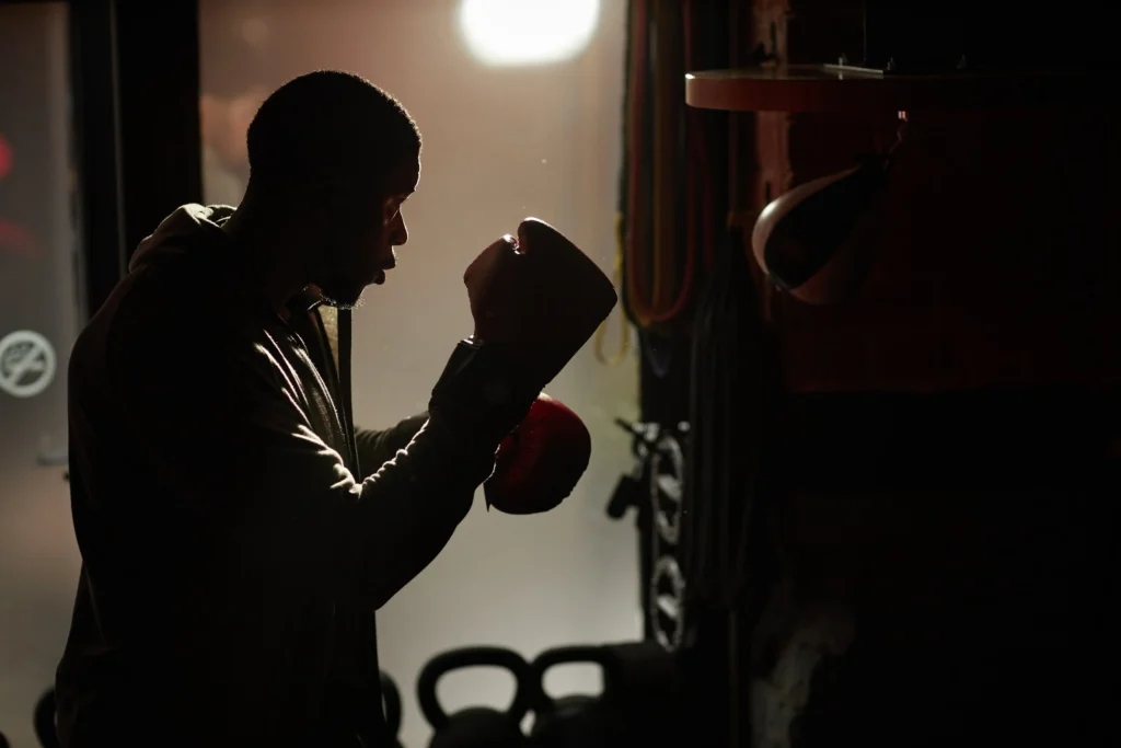 outline of young african american male boxer